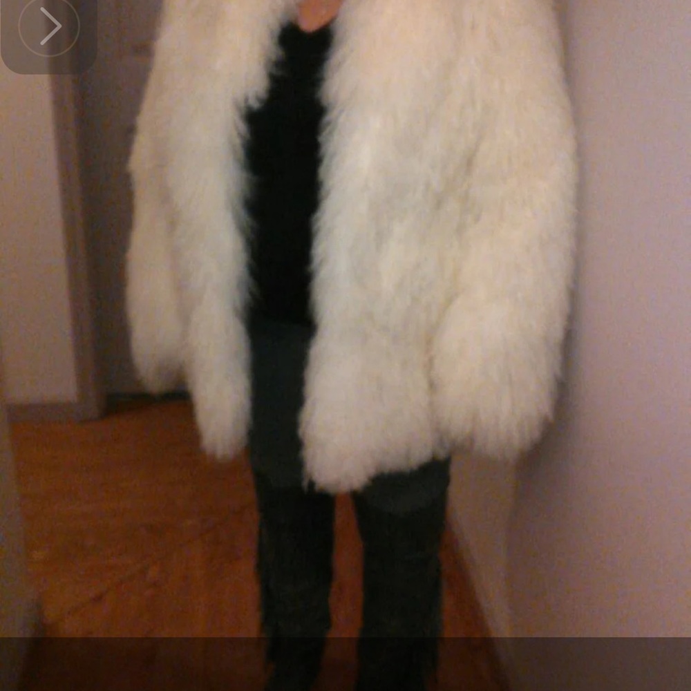 Mongolian sheep fur coat. Beautiful